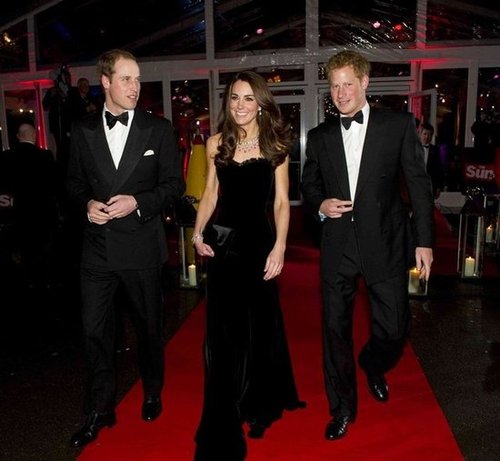 Kate Middleton hit the red carpet in a black velvet Alexander McQueen gown at the Sun Military Awards in London with husband Prince William and brother-in-law Prince Harry in tow.
Kate Middleton hit the red carpet in a black velvet Alexander McQueen gown at the Sun Military Awards in London with husband Prince William and brother-in-law Prince Harry in tow.