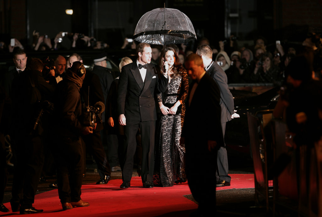 Prince William held the umbrella for Kate at the War Horse premiere in 2012.
Prince William held the umbrella for Kate at the War Horse premiere in 2012.