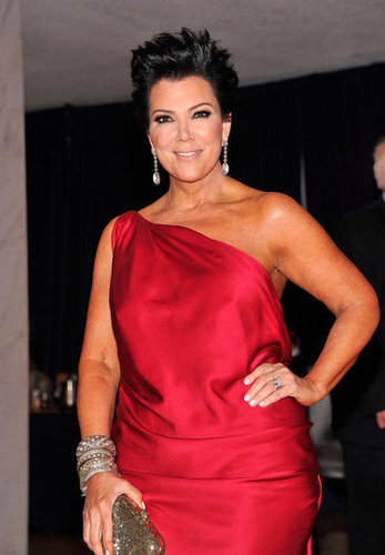 Kris Jenner posed in a red one-shoulder dress.
Kris Jenner posed in a red one-shoulder dress.