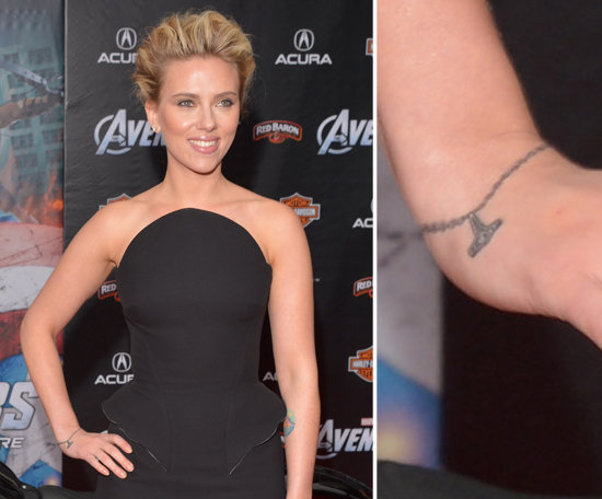 NYC native Scarlett Johansson debuted a bracelet-esque tattoo in 2012. The ink even features a charm that reads "I (heart) NY."
NYC native Scarlett Johansson debuted a bracelet-esque tattoo in 2012. The ink even features a charm that reads "I (heart) NY."