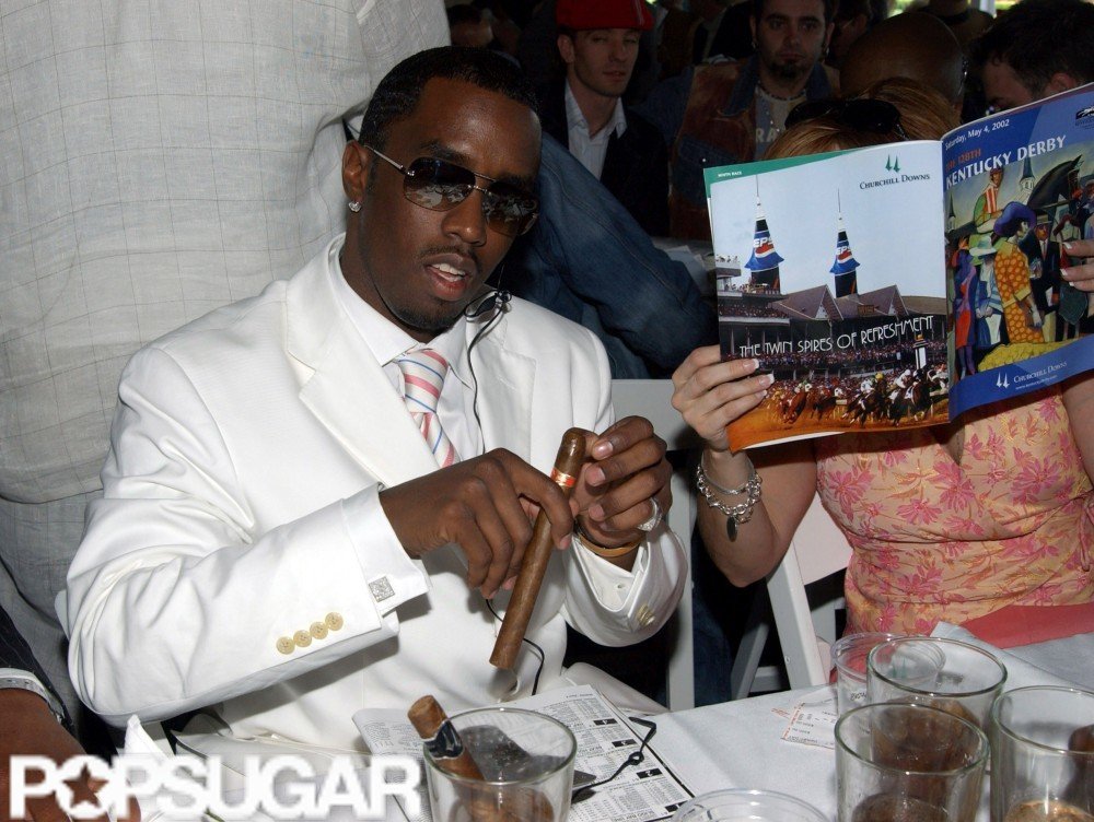 Diddy smoked a cigar during the 2001 races.
Diddy smoked a cigar during the 2001 races.