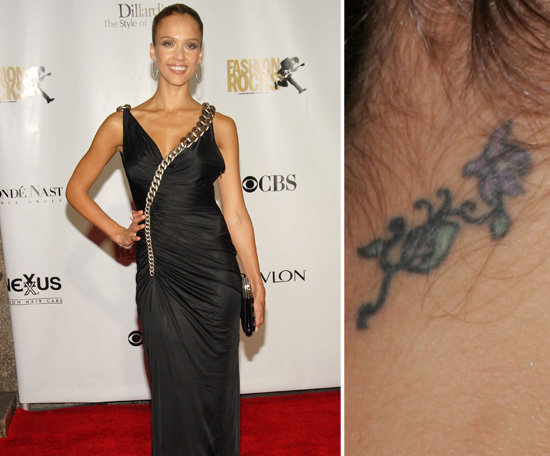 Jessica Alba has a flower vine tattooed on the back of her neck.
Jessica Alba has a flower vine tattooed on the back of her neck.