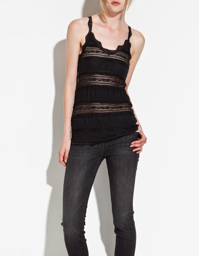 Scalloped edges and sheer lace panels make this romantic tank ideal for Summer date nights.
Zara Lace T-Shirt ($26)
Scalloped edges and sheer lace panels make this romantic tank ideal for Summer date nights.
Zara Lace T-Shirt ($26)