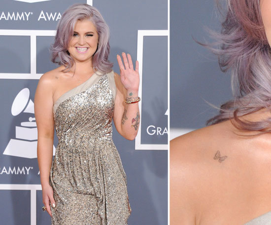 A little butterfly tattooed on her right shoulder is one of Kelly Osbourne's 15 tattoos.
A little butterfly tattooed on her right shoulder is one of Kelly Osbourne's 15 tattoos.