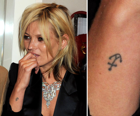 Kate Moss has a small anchor tattooed on the outside of her right wrist.
Kate Moss has a small anchor tattooed on the outside of her right wrist.