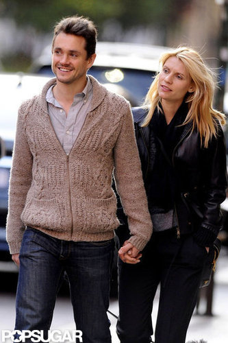 Claire Danes and Hugh Dancy held hands during a walk.
Claire Danes and Hugh Dancy held hands during a walk.