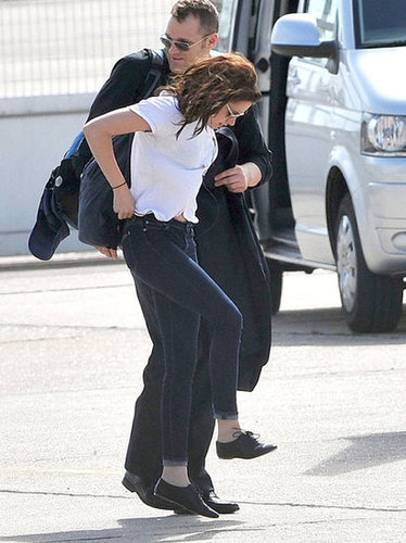 Kristen Stewart adjusted her pants.
Kristen Stewart adjusted her pants.