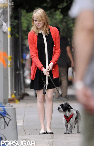 Emma Stone wore a red cardigan over a black dress to bid farewell to her mom after a visit in NYC.
Emma Stone wore a red cardigan over a black dress to bid farewell to her mom after a visit in NYC.