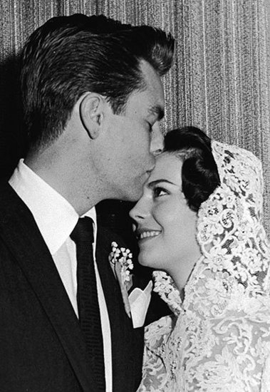 Robert Wagner Plants a Kiss on Natalie Wood