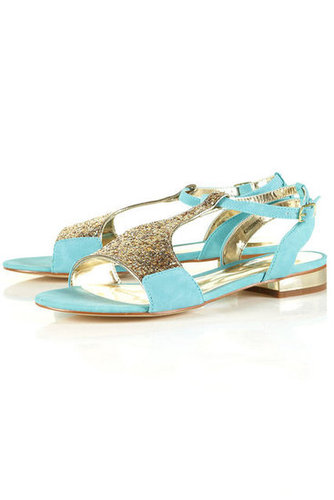Wear these shiny mint sandals with cool shades for a coordinating, colorblocked look.
Topshop Hidden Mint Glitter Sandals ($60)
Wear these shiny mint sandals with cool shades for a coordinating, colorblocked look.
Topshop Hidden Mint Glitter Sandals ($60)