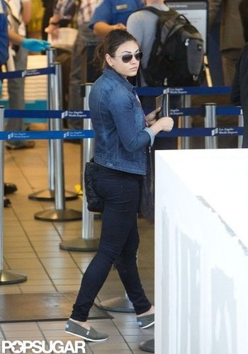 Mila Kunis celebrated in the air after taking off from LAX.
Mila Kunis celebrated in the air after taking off from LAX.
