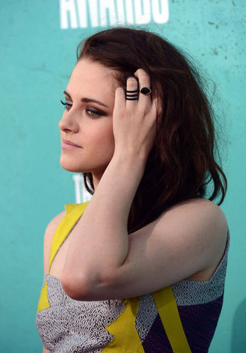 Kristen Stewart ran her fingers through her hair on the red carpet at the MTV Movie Awards.
Kristen Stewart ran her fingers through her hair on the red carpet at the MTV Movie Awards.