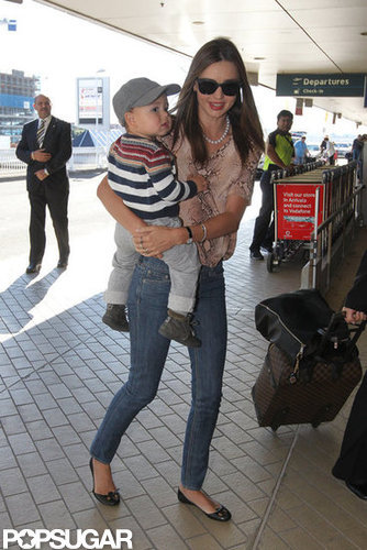 Miranda Kerr carried son, Flynn Bloom, at the Sydney airport.
Miranda Kerr carried son, Flynn Bloom, at the Sydney airport.