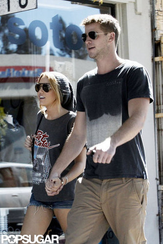 Miley Cyrus and Liam Hemsworth held hands as they shopped around LA in August 2011.
Miley Cyrus and Liam Hemsworth held hands as they shopped around LA in August 2011.