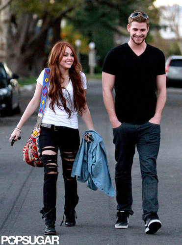 Liam Hemsworth and Miley Cyrus smiled as they headed to a friend's LA house to watch the Super Bowl in February 2010.
Liam Hemsworth and Miley Cyrus smiled as they headed to a friend's LA house to watch the Super Bowl in February 2010.