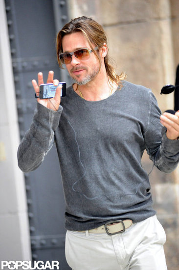 Brad Pitt waved to the camera in Germany. Brad Pitt waved to the camera in Germany.