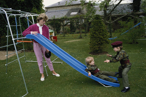 Prince William and Prince Harry played in uniforms in the garden of Highgrove House in Gloucestershire, England, in July 1986 with their mom, Princess Diana.
Prince William and Prince Harry played in uniforms in the garden of Highgrove House in Gloucestershire, England, in July 1986 with their mom, Princess Diana.