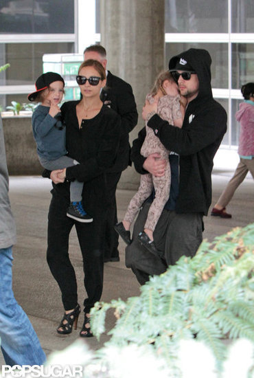 Nicole Richie, Joel Madden, Harlow Madden, and Sparrow Madden made their way through the airport. Nicole Richie, Joel Madden, Harlow Madden, and Sparrow Madden made their way through the airport.