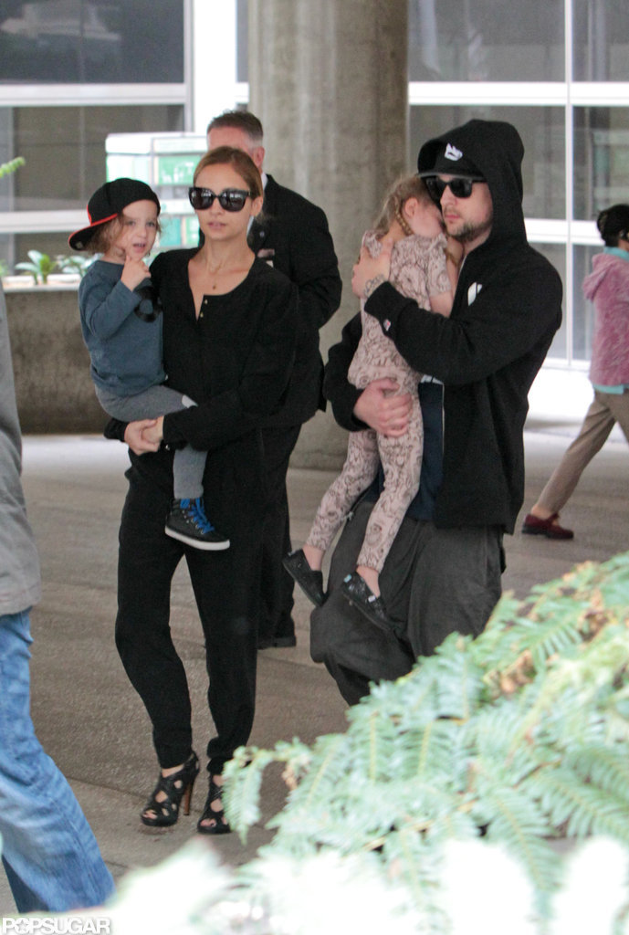 Nicole Richie, Joel Madden, Harlow Madden, and Sparrow Madden made their way through the airport. Nicole Richie, Joel Madden, Harlow Madden, and Sparrow Madden made their way through the airport.