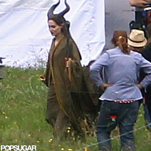 Angelina Jolie on the Maleficent set in costume.
Angelina Jolie on the Maleficent set in costume.