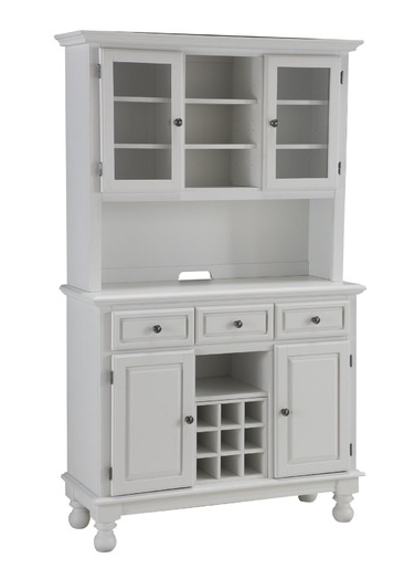 Use the top of this Hutch and Buffet ($775) to display decorative pieces, from tabletop decor to barware, and the lower cabinets to store more unsightly housewares and bottles of wine.
Use the top of this Hutch and Buffet ($775) to display decorative pieces, from tabletop decor to barware, and the lower cabinets to store more unsightly housewares and bottles of wine.