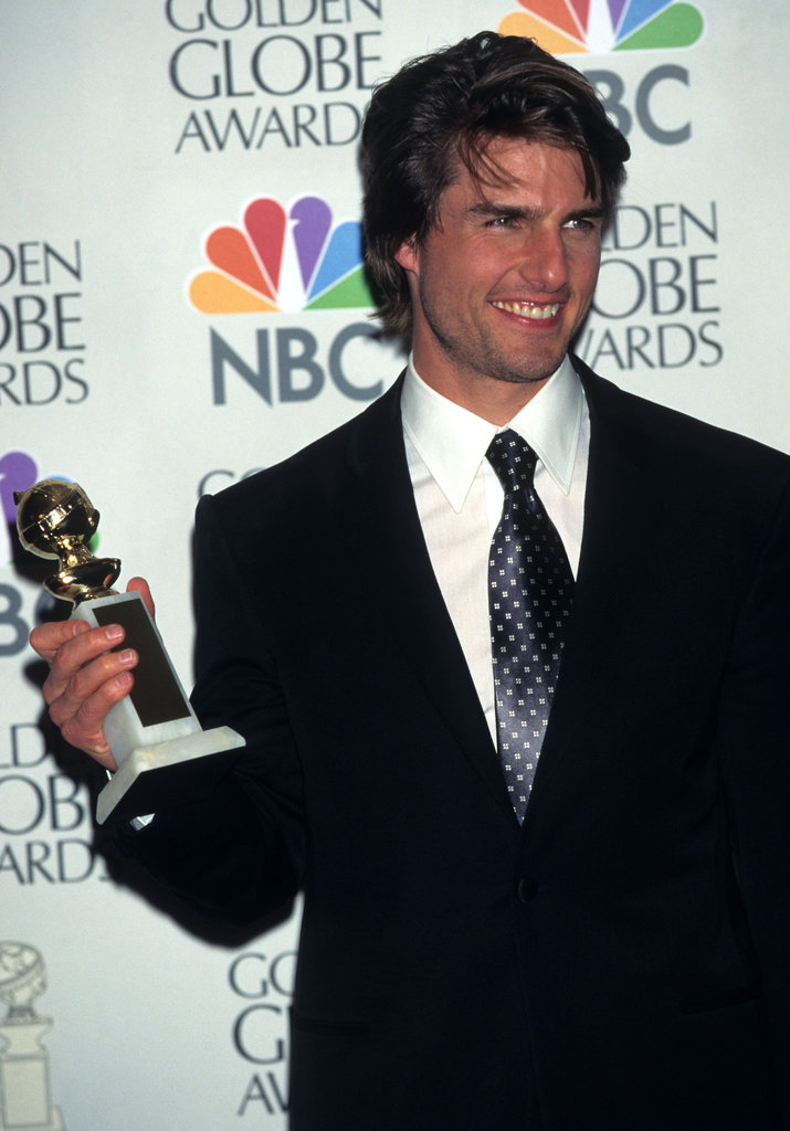 Tom Cruise proudly held up his Golden Globe in 1997.
Tom Cruise proudly held up his Golden Globe in 1997.