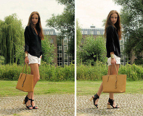 A work-appropriate look that still reads Summery: graphic black and white shades mixed with a hint of neutral.
Photo courtesy of Lookbook.nu
A work-appropriate look that still reads Summery: graphic black and white shades mixed with a hint of neutral.
Photo courtesy of Lookbook.nu