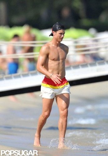 Cristiano Ronaldo sported short swim trunks and a baseball cap while hanging on the beach in Saint-Tropez in July.
Cristiano Ronaldo sported short swim trunks and a baseball cap while hanging on the beach in Saint-Tropez in July.