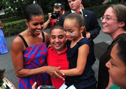 First Lady Michelle Obama hugged it out at a BBQ for White House staff and servicemen and women in 2011.
First Lady Michelle Obama hugged it out at a BBQ for White House staff and servicemen and women in 2011.