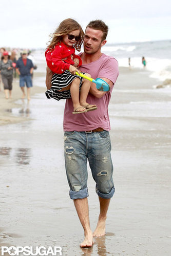 Cam Gigandet played with his daughter, Everleigh, during a Malibu beach party.
Cam Gigandet played with his daughter, Everleigh, during a Malibu beach party.