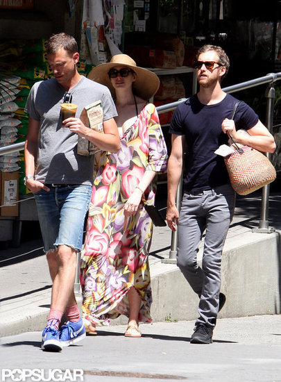 Anne Hathaway walked in NYC in a long floral dress on the Fourth of July. Anne Hathaway walked in NYC in a long floral dress on the Fourth of July.