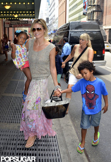 Heidi Klum pulled her hair up while hanging out with her kids in NYC. Heidi Klum pulled her hair up while hanging out with her kids in NYC.