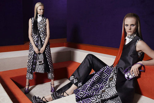 Prada's optic prints, dip-dyed hair, and long vests are all on display.
Prada's optic prints, dip-dyed hair, and long vests are all on display.