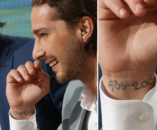 Shia LaBeouf has dates scribed on the inside of his right wrist that say: "1986-2004." In an interview Shia talked about the dates and referred to the timespan as a reference to his "childhood."
Shia LaBeouf has dates scribed on the inside of his right wrist that say: "1986-2004." In an interview Shia talked about the dates and referred to the timespan as a reference to his "childhood."