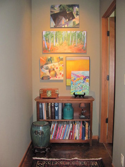 Don't just hang a picture. Fill the wall with artwork to make an impact with color.