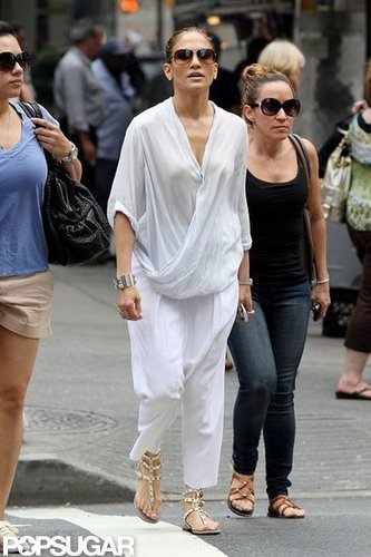 Jennifer Lopez walked through NYC in a white jumpsuit.
Jennifer Lopez walked through NYC in a white jumpsuit.
