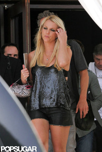 Britney Spears brushed back her hair.
Britney Spears brushed back her hair.