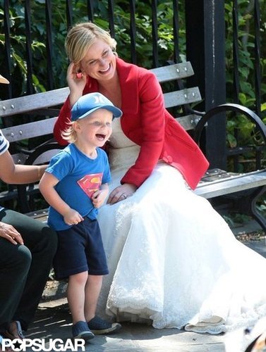 Amy Poehler Gets Close With Pal Paul and Son Archie on Set Amy Poehler Gets Close With Pal Paul and Son Archie on Set
