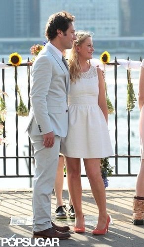 Amy Poehler Gets Close With Pal Paul and Son Archie on Set Amy Poehler Gets Close With Pal Paul and Son Archie on Set