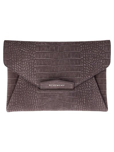 The bag: Givenchy Envelope Clutch ($903)
Why we love it: Exotic textures like this, especially in a cool, neutral gray, are a mainstay in the fashion world. The textural intrigue adds dimension to your look, and the envelope structure, while hugely popular this year, isn't going anywhere anytime soon. Consider this a worthy upgrade on your go-with-anything evening clutch. It will be just that.
The bag: Givenchy Envelope Clutch ($903)
Why we love it: Exotic textures like this, especially in a cool, neutral gray, are a mainstay in the fashion world. The textural intrigue adds dimension to your look, and the envelope structure, while hugely popular this year, isn't going anywhere anytime soon. Consider this a worthy upgrade on your go-with-anything evening clutch. It will be just that.