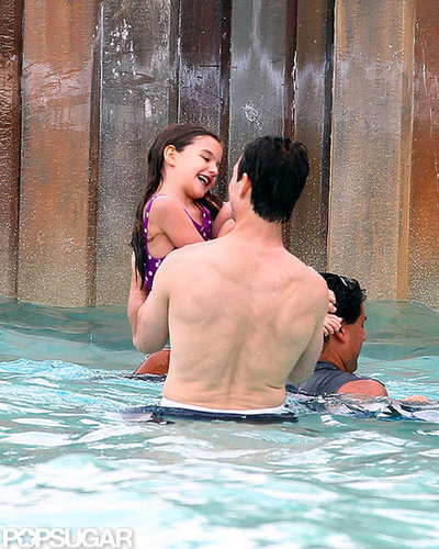 Suri Cruise was all smiles as she and Tom Cruise played at the water park.
Suri Cruise was all smiles as she and Tom Cruise played at the water park.