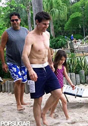 Tom Cruise and Suri Cruise held hands at the water park.
Tom Cruise and Suri Cruise held hands at the water park.