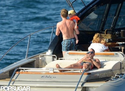 David Furnish worked on his tan.
David Furnish worked on his tan.