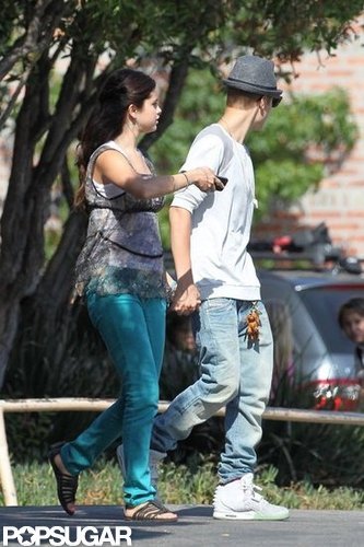 Justin Bieber and Selena Gomez held hands while she took a break from filming.
Justin Bieber and Selena Gomez held hands while she took a break from filming.