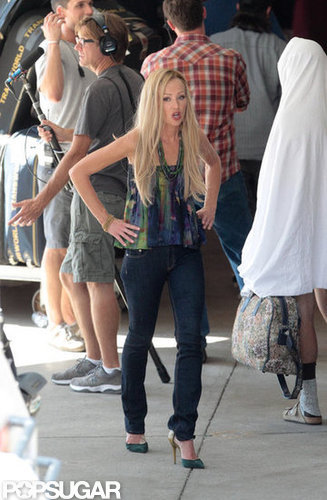 Portia de Rossi walked through a scene in LA.
Portia de Rossi walked through a scene in LA.