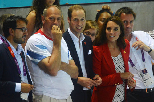 Kate switched up her usual navy-blazer-and-white-polo outfit with a decidedly more playful and printed touch. We spotted her (literally) in a polka-dotted top and slick red blazer at the Olympic swimming pool alongside her well-dressed husband.
Kate switched up her usual navy-blazer-and-white-polo outfit with a decidedly more playful and printed touch. We spotted her (literally) in a polka-dotted top and slick red blazer at the Olympic swimming pool alongside her well-dressed husband.