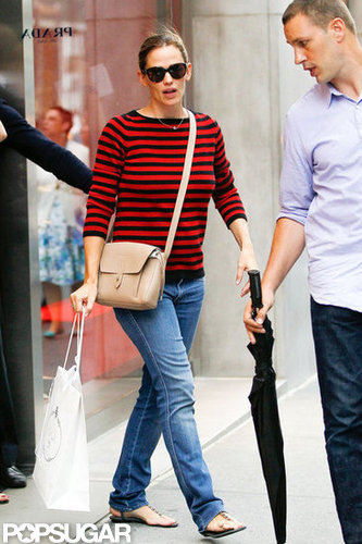 Jennifer Garner wore a purse over her shoulder as she carried a Prada bag.
Jennifer Garner wore a purse over her shoulder as she carried a Prada bag.