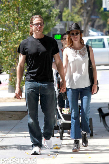 January Jones held hands with a man. January Jones held hands with a man.