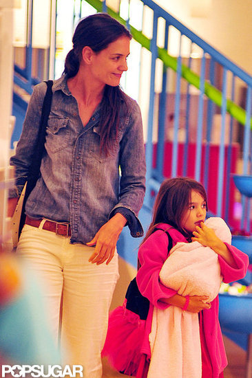 Suri Cruise and Katie Holmes went shopping in NYC. Suri Cruise and Katie Holmes went shopping in NYC.