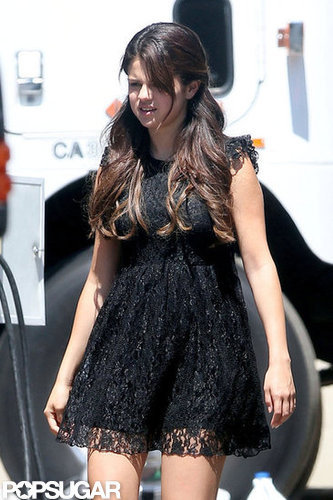 Selena Gomez wore a black lace dress on the set of Feed the Dog.
Selena Gomez wore a black lace dress on the set of Feed the Dog.